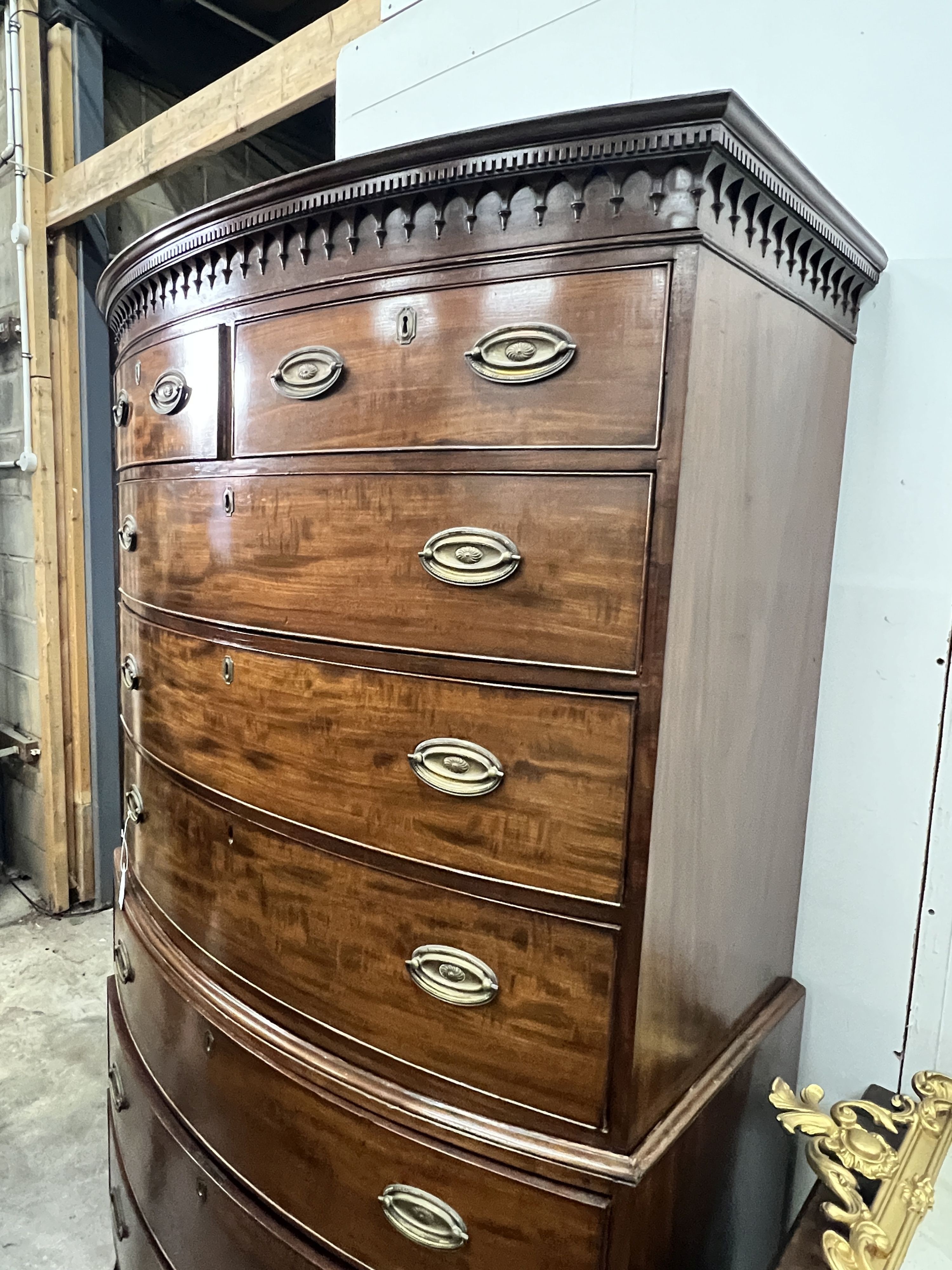 A George IV mahogany bow front chest on chest, width 116cm, depth 65cm, height 193cm